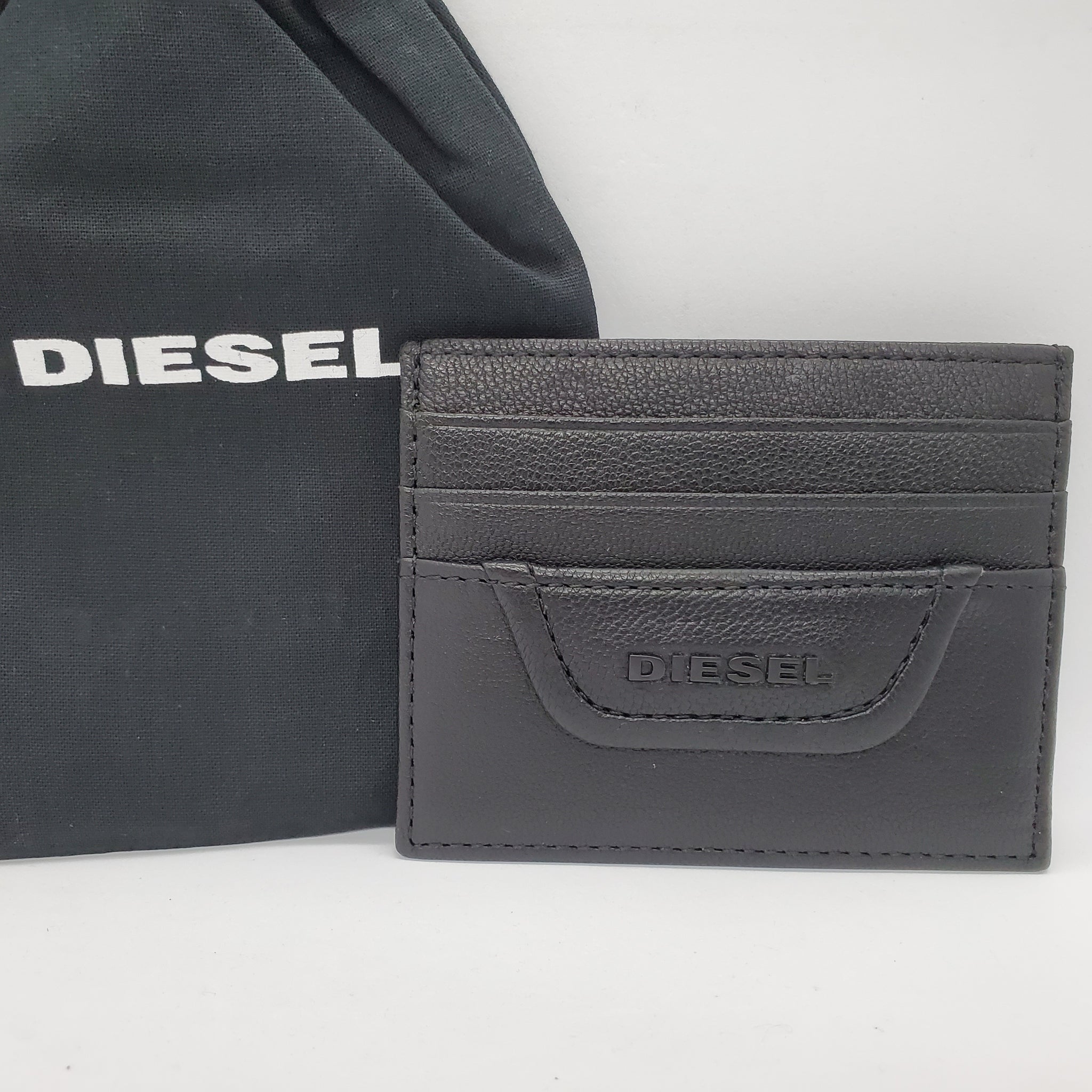 現貨】Diesel 男裝真皮卡片套附收納袋– ShopYours